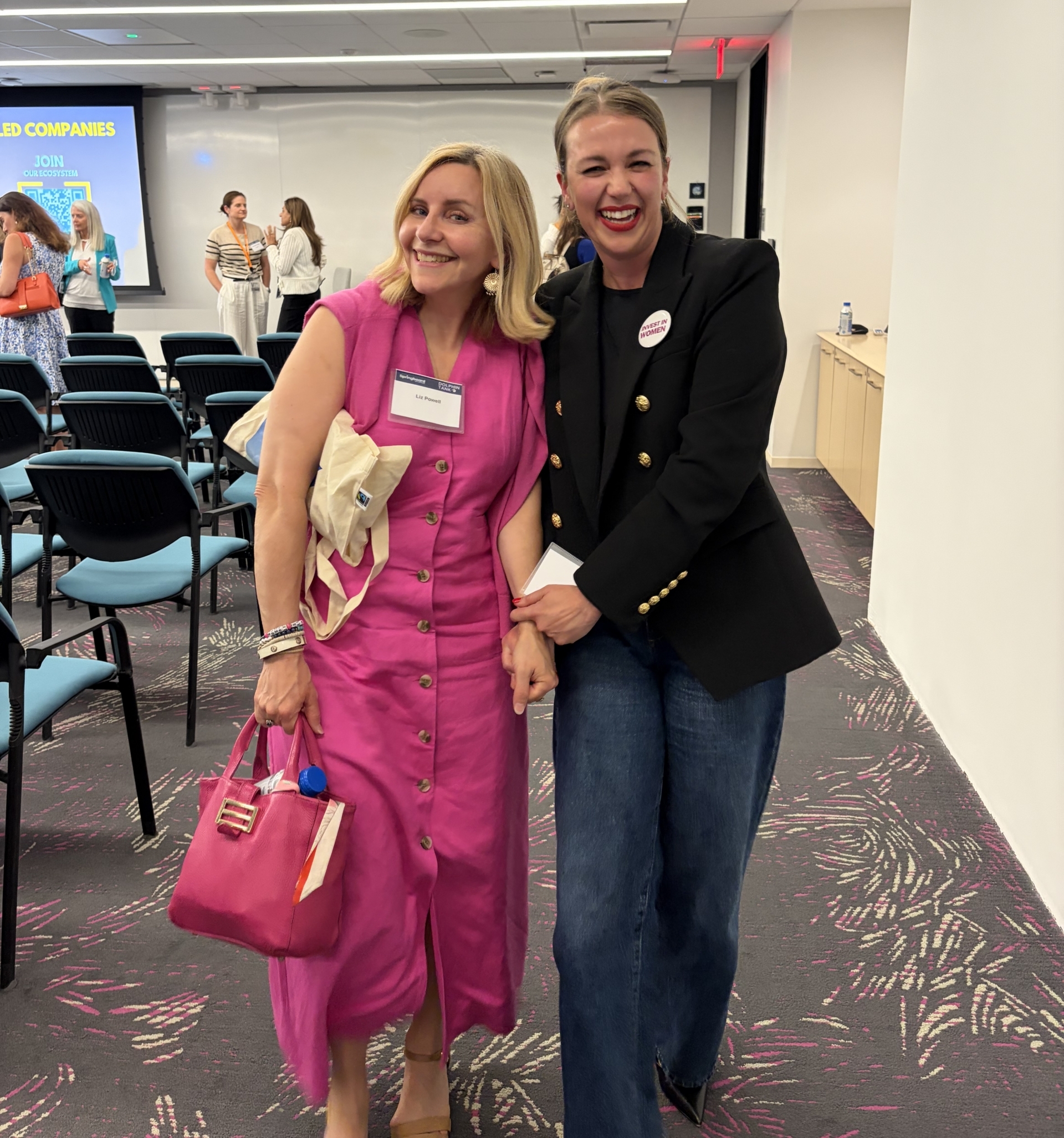 Two women smiling at the camera